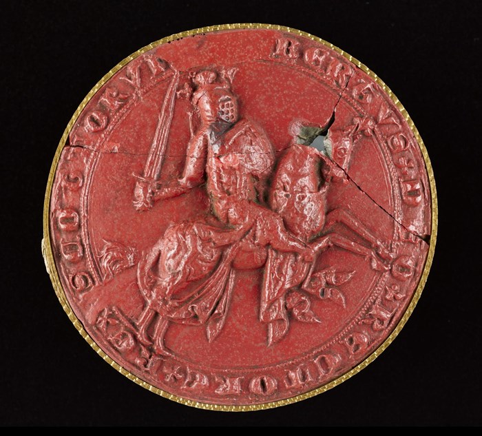 Red, waxy seal of Robert the Bruce with the king mounted and riding forth with sword in hand.