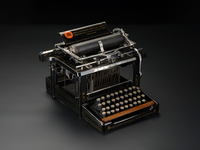 An old-fashioned black typewriter.