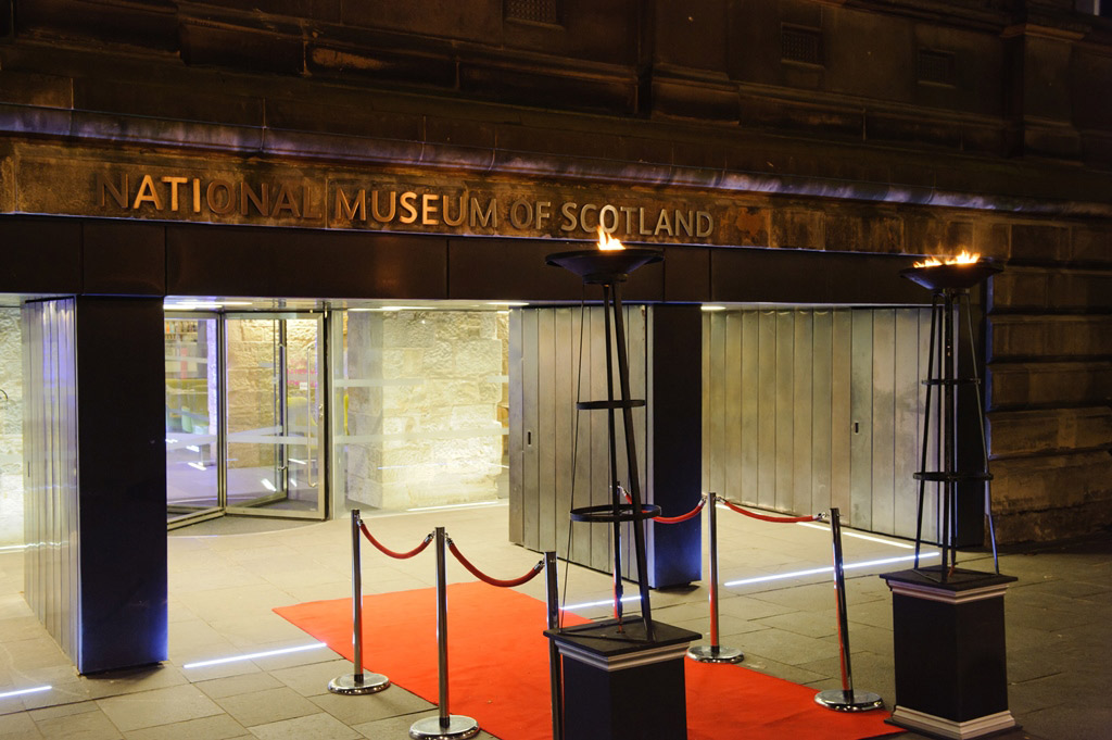 A red carpet entrance at Chambers Street entrance to National Museum of Scotland.