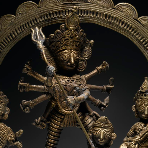 Cast brass figure of the Hindu goddess Durga as Mahishasura slaying the buffalo demon Mahisha.