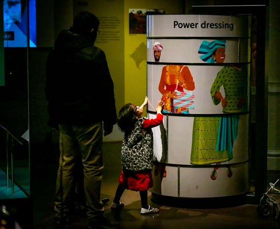 Child interacting with a display in the Patterns of Life gallery. 