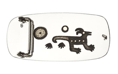 The back side of the belt buckle is silver and incorporates designs using the underlay technique: Yazzie Johnson and Gail Bird, 2009
